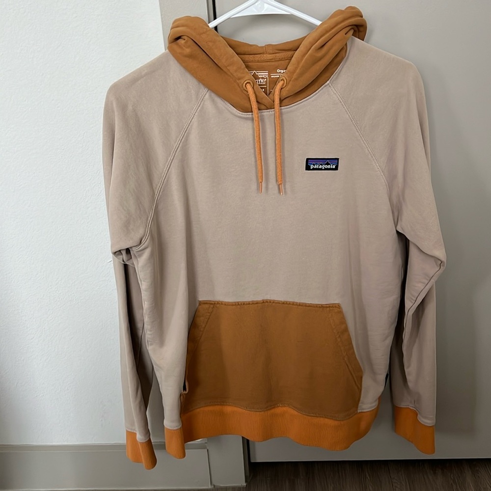 tan and orange hoodie